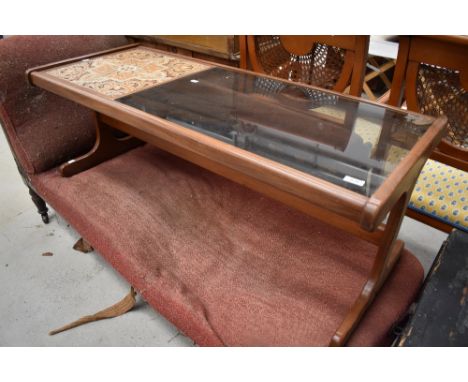 A 1970's tile and glass topped teak coffee table