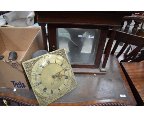 A longcase clock face, 30 hour movement, brass face , named for Whitfield, Clifton and an oak clock hood