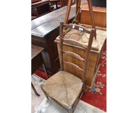 A 19th Century rush seated ladder back chair
