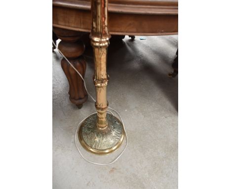 An interesting brass standard lamp, with bamboo design