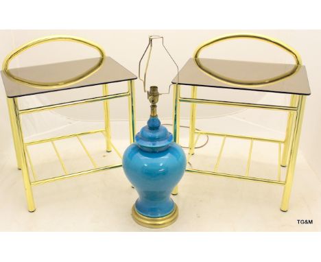A pair of modern glass side tables and a blue side lamp 56 x 45 x 36cm
