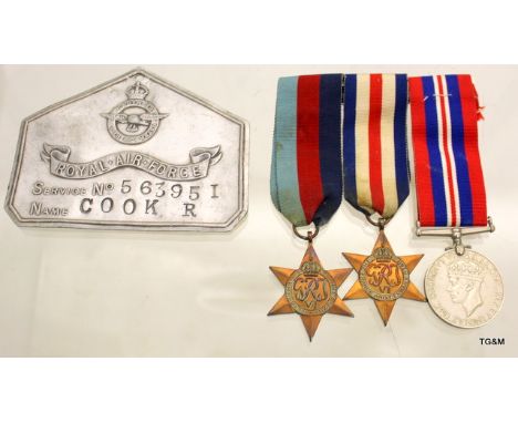 An aluminium Royal Air Force bed plate named to 563951 R Cook with his WW2 mounted medal trio including the France & Germany 