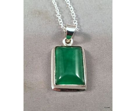 A silver and jade pendant necklace