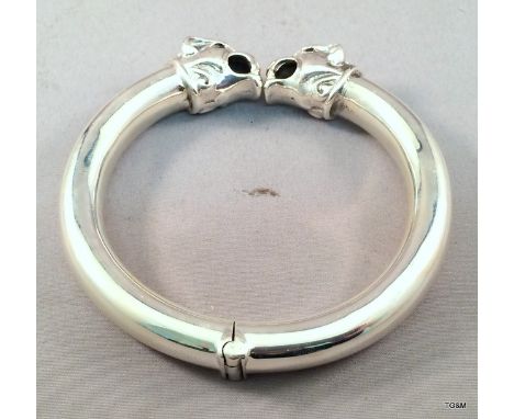 A good silver Chinese silver dragon head bangle