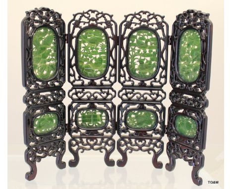 A Chinese Jade and hardwood four fold table screen in silk lined case