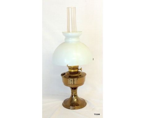 An oil lamp and glass flue