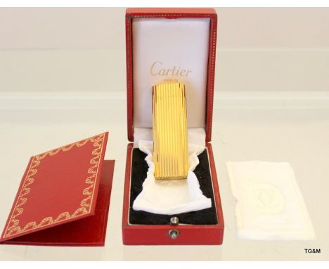 A Gents Cartier gold plated boxed lighter