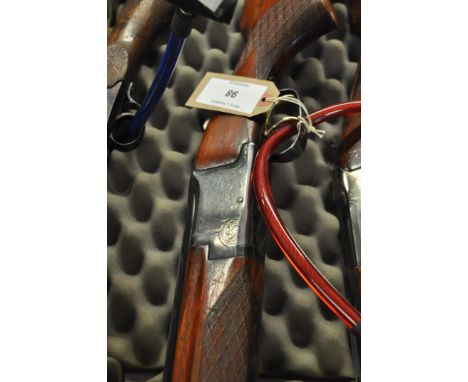12 BORE LAURONA O/U DOUBLE TRIGER FRONT TRIGER FIRES BOTH BARRELS NO. 134432.  THIS ITEM CAN ONLY BE PURCHASED BY SOMEONE WIT