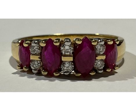 An 18ct gold ruby and diamond ring, set with four graduated faceted oval rubies, divided by six diamonds, size N, 3.4g, boxed