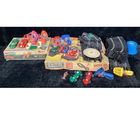 A Scalextric Set 31 racing set boxed; another, Scalextric Conversion Set; etc 