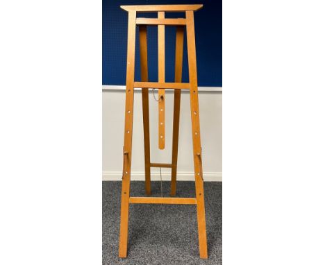 A large floor standing artist's easel, 181cm high open, 66cm wide at the base 