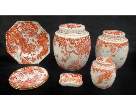 A set of three Royal Crown Derby Red Aves pattern graduated ovoid Ginger Jars and covers, 21cm, 18cm and 11cm; an octagonal R