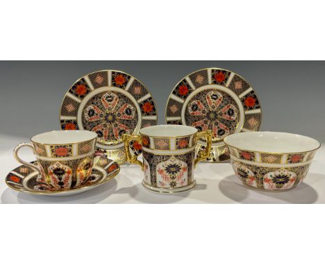 A Royal Crown Derby 1128 two-handled  Christening cup, first quality; a pair of side plates, first quality; sugar bowl, first