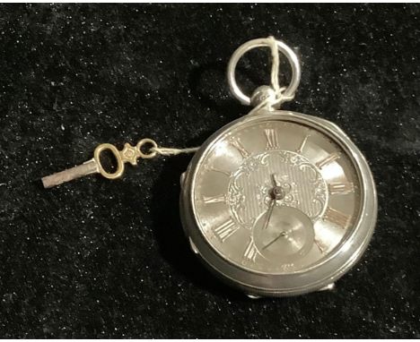 A Victorian open face pocket watch, engine turned dial, subsidiary seconds dial, Chester 1899 