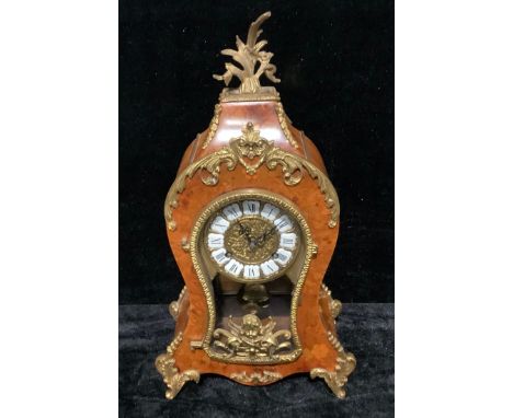 A Louis XV revival reproduction mantel clock, 43cm high 