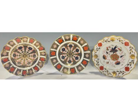 A Royal Crown Derby 1128 pattern plate, 22cm diameter, first quality; an Asian Rose pattern shaped circular plate, 22cm diame