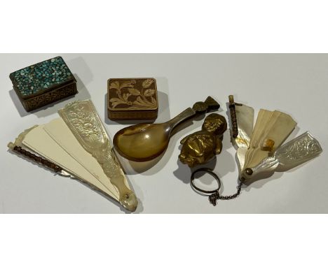 A Victorian mother of pearl aide memoir; another; a horn caddy spoon; a rattle; a turquoise set snuff; a small Black Forest b