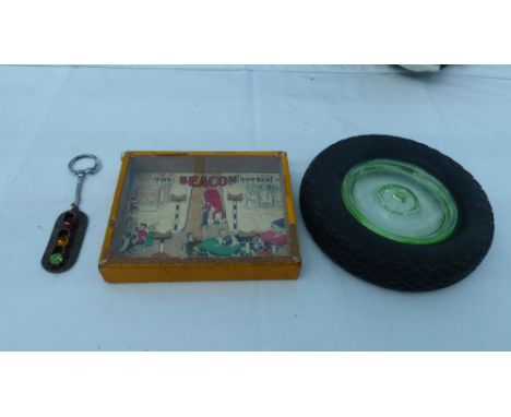 Automobilia - A Beacon car puzzle, a Goodyear car tyre promotional item NOT an ashtray and a 1950s traffic light key ring. 