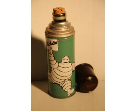 A pre- war thermos flask , possibly continental, advertising Michelin tyres.