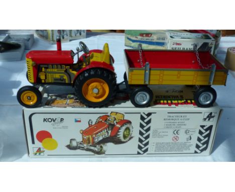 Boxed and mint, "Zetor" tractor and trailer. Czech made, with 4 speed key wind driver, including reverse! Glorious item.