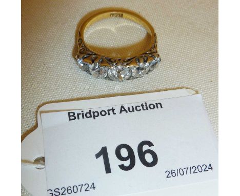 18ct gold with 5 diamonds bar engagement ring, graduating from largest size of 0.5ct. Approx. UK size O, and weight 4.5g.