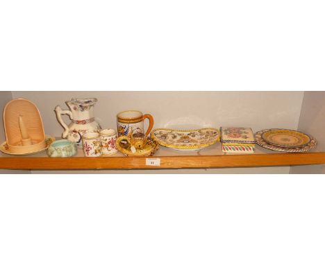 Cantigalli pottery chamber stick, a Deruta mug, a Quimper lidded box and dish and other pottery