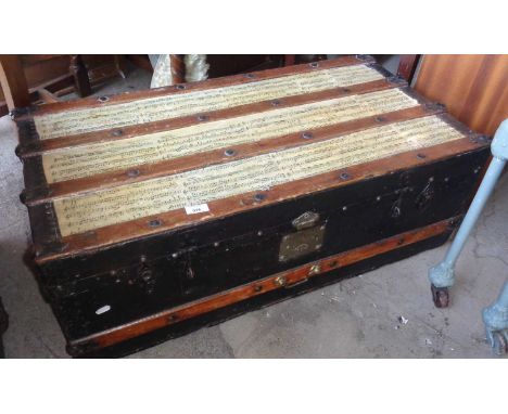 Old cabin trunk with wood slats
