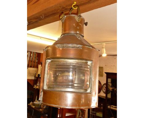 Large copper ship's lantern marked as BOW PORT PATT 23