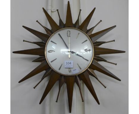 A Metamec Sunburst wall clock