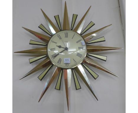 A Metamec Sunburst wall clock