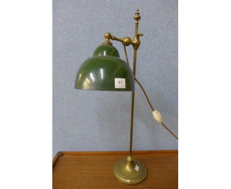 A brass anglepoise table lamp