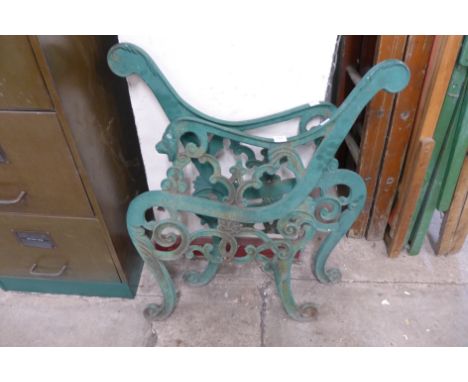 A pair of cast iron bench ends