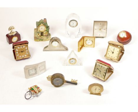 A collection of miniature novelty quartz clocks, together with bedside alarm clocks having manual wind movements.