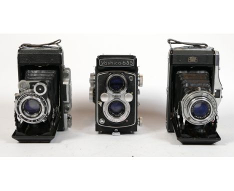 Medium Format cameras, including a Yashica 635 TLR, a Zeiss Nettar 517/2 6x9 and a Moscow Zeiss Super Ikonta Copy