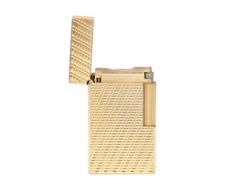 S.T. Dupont; A gold plated gents gas lighter, having diagonal guilloche design. Cosmetically in very good condition, showing 