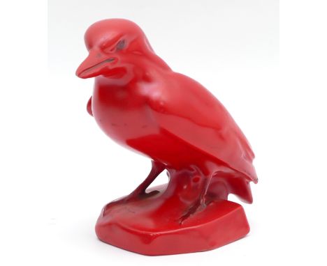 A red ceramic bird, stamped 'Rubin'.