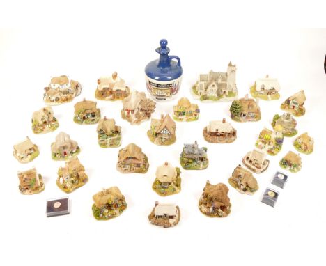 A collection of over twenty Lilliput Lane model cottages, together with seven enamelled pin badges.