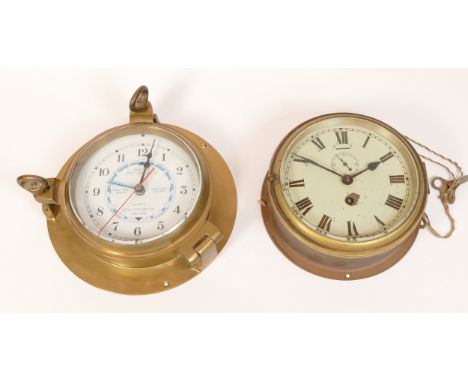 A 20th century Swiss made brass bulkhead clock, having manual wind movement, 14cm dial diameter, together with a modern quart