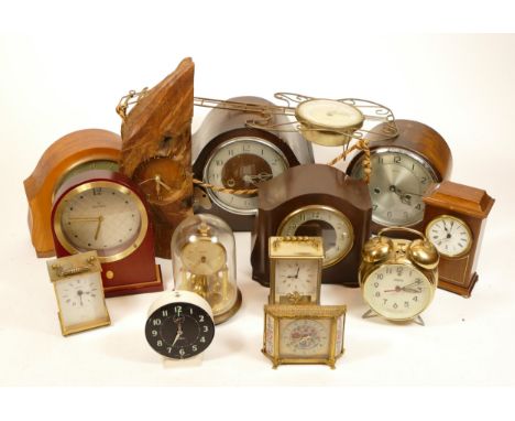 A collection of mid 20th century and later mantel clocks, having manual and quartz movements in two boxes. (2)