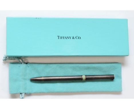 Tiffany &amp; Co., a silver and enamel ball point biro, lacking clip, pouch, box