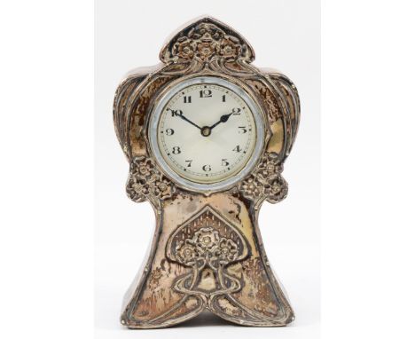An Art Nouveau silver mounted mantel clock, by Green & Cadbury Ltd., Birmingham 1910, 15cm.Movement not working, silver in go