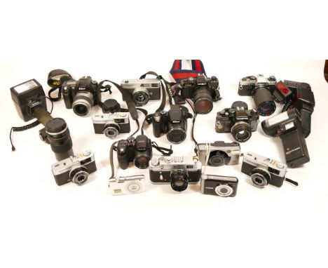 A Collection of Cameras, including digital compacts, a Nikon D50, a Zorki 4K with Jupiter 8 lens, two packs of expired Ilford