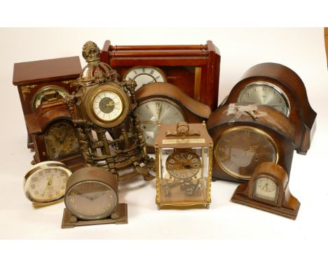 A collection of mid 20th century and later mantel clocks, having manual and quartz movements in two boxes. (2)