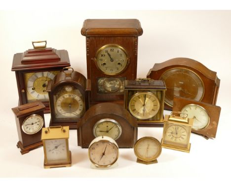 A collection of mid 20th century and later mantel clocks, having manual and quartz movements in two boxes. (2)