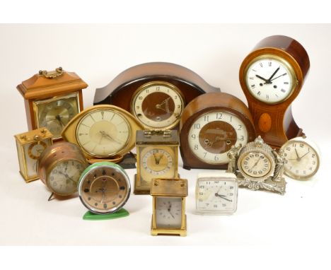 A collection of miniature novelty and bedside clocks, having quartz and manual movements, in two boxes. (2)