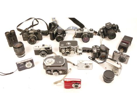 A Collection of Cameras, including Panasonic Lumix G1 with 14-45mm lens, an Olympus Trip 35, a black Canon FTBn-QL with 50mm 