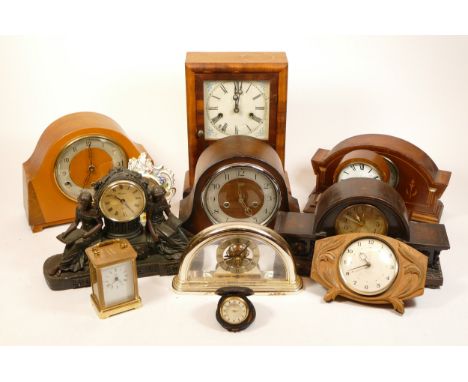 A collection of mid 20th century and later mantel clocks, having manual and quartz movements in two boxes. (2)