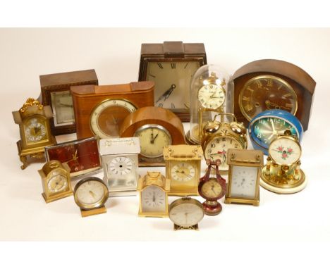 A collection of mid 20th century and later mantel clocks, having manual and quartz movements in three boxes. (3)