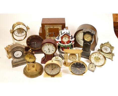 A collection of mid 20th century and later mantel clocks, having manual and quartz movements in two boxes. (2)