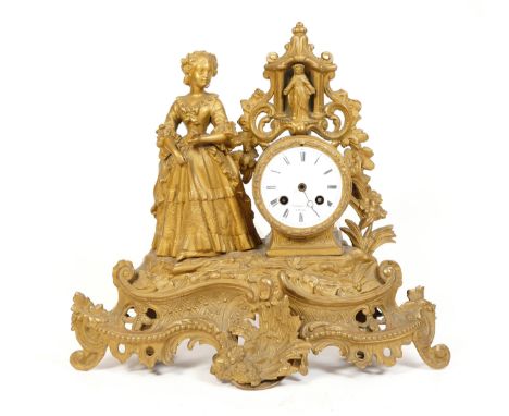 A 20th century Italian Imperial style gilt cast brass mantel clock, female figure above scrolling decoration, the 8 day movem